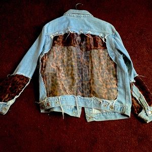 Jean jacket from Top shop has cheetah print on back and sleeves